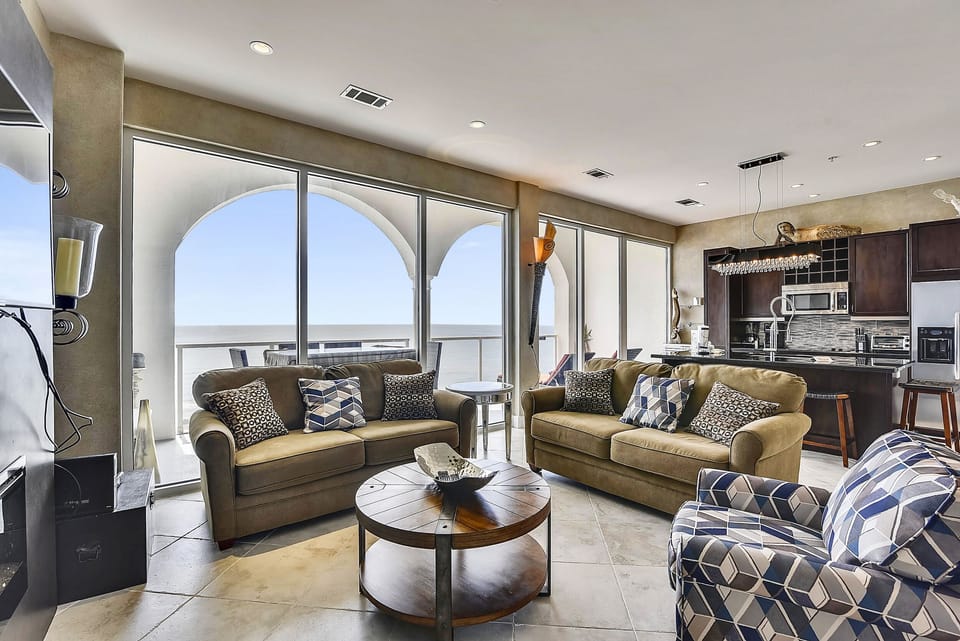 Easy Access - The living room provides quick and easy access to the patio where you can sit and enjoy your surroundings.
