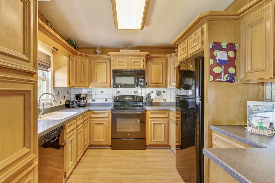 Talk About Your Dream Kitchen - The lavish kitchen is fully equipped with everything you need to prepare and serve great food to your loved ones.