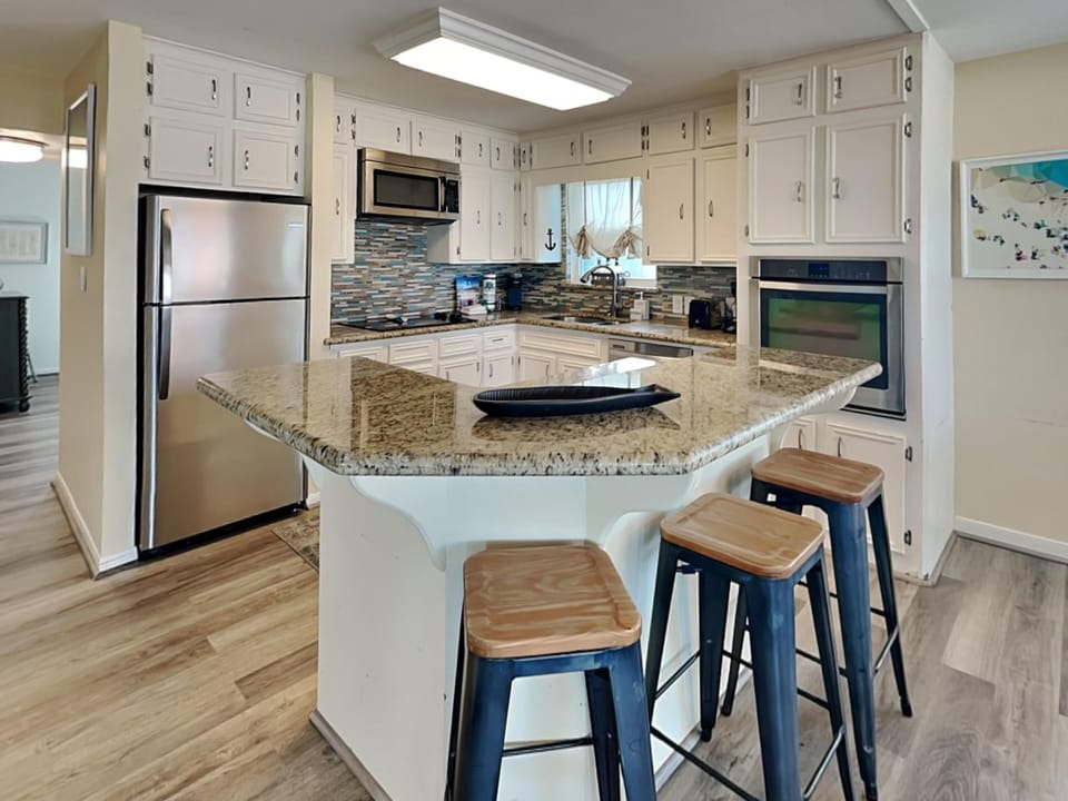 Kitchen - Countertop seating for 3 - First Floor