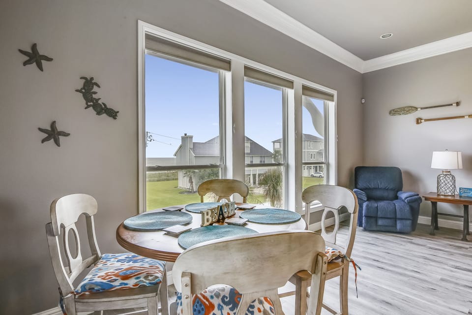 Cozy Dining - Seating for four at your dining room table provides a cozy atmosphere for a home cooked family dinner, right outside your kitchen area.