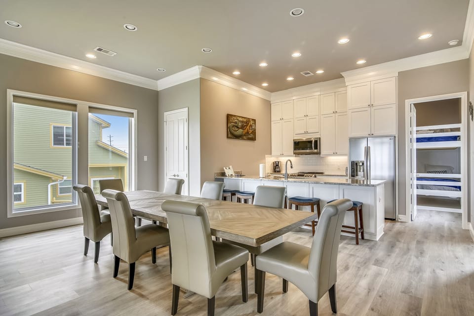 Games or Grub? - The large dining room table is ideal for group meals. But it’s also the perfect spot to host a game of Go Fish or Uno with the kids.