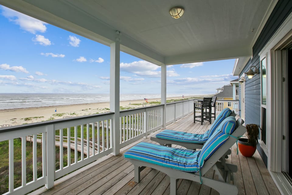 Relaxation on the Balcony - After a long day of fun, relax on the comfortable couch or gather around the table with friends and family to plan your next day's adventures.
