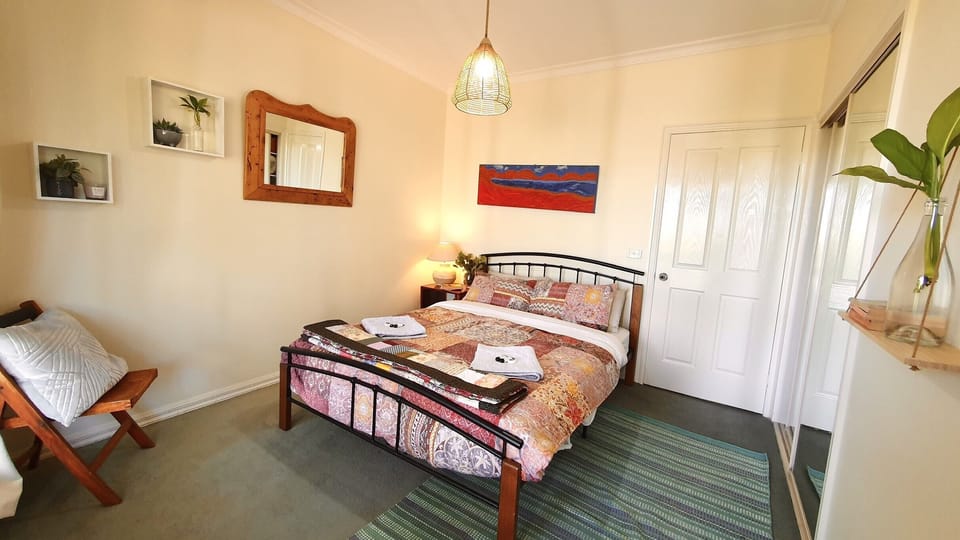 Features a large inbuilt wardrobe and views of the mountains