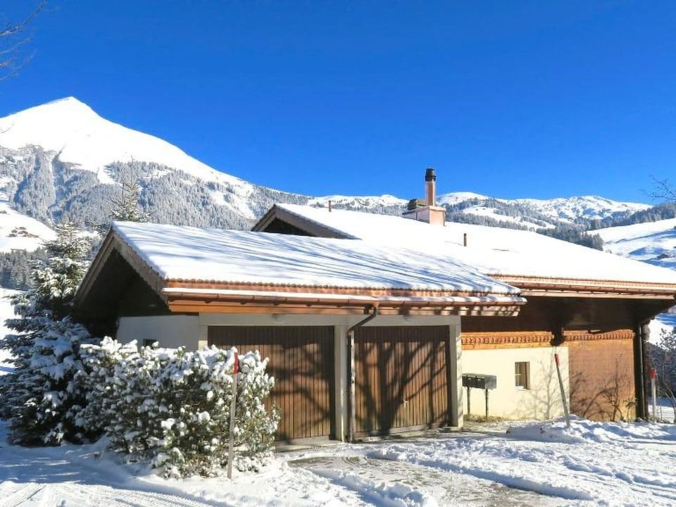 Sky, Snow, Mountain, Building, Property, Plant, Window, Blue, House, Slope