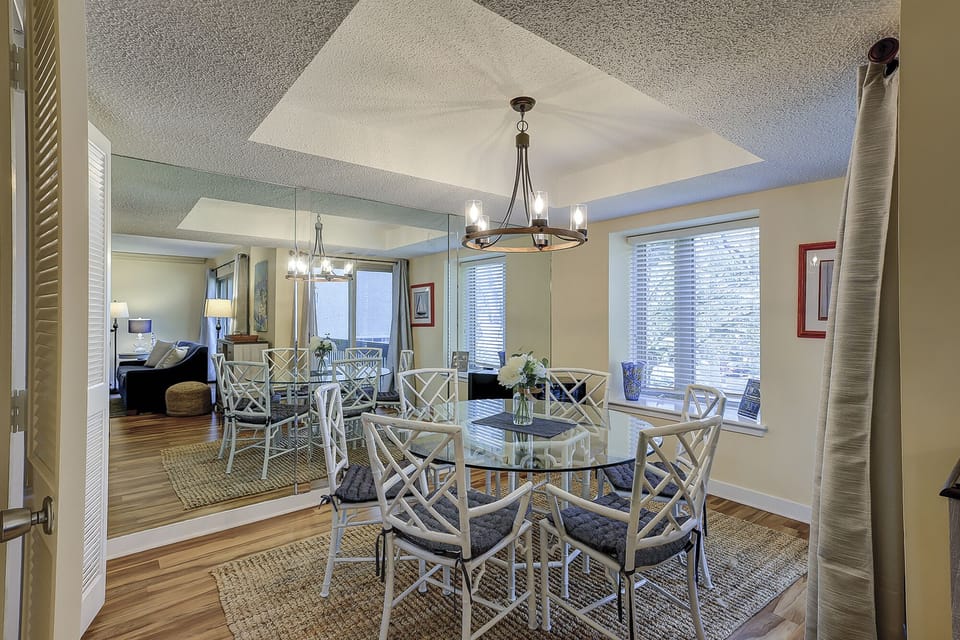 Dining Glass Top Table has seating for six.