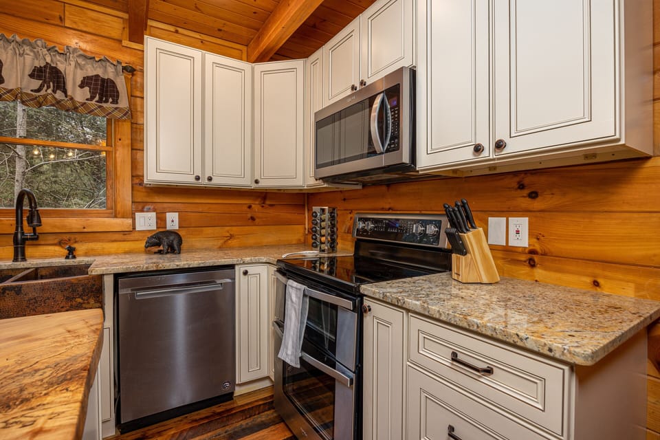 Enjoy cooking in this brand new kitchen with top-of-the-line appliances. 