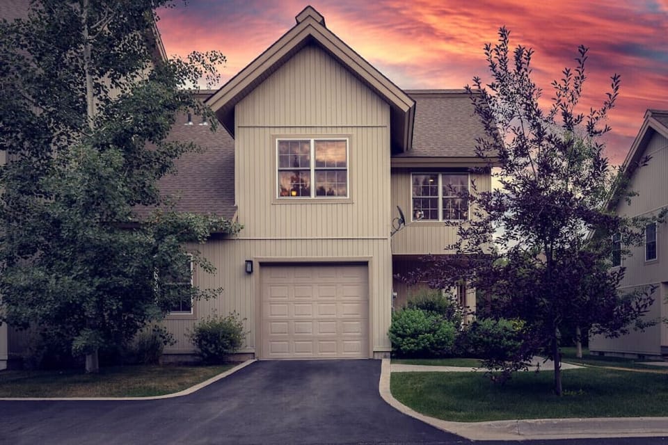 Summer Exterior Front with Attached Garage