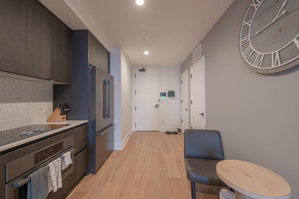Kitchen and condo entry