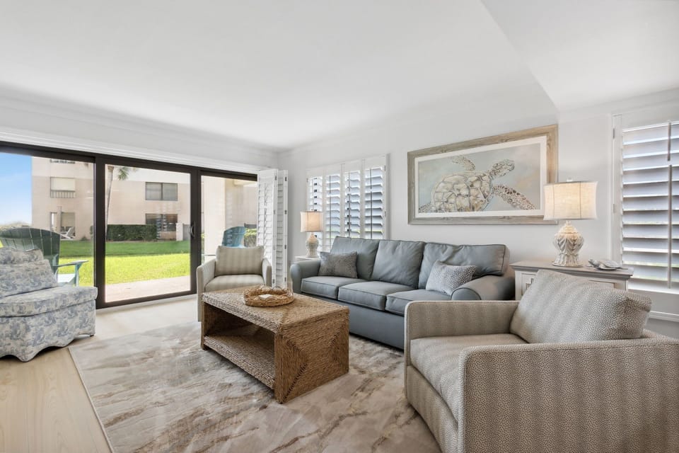 Spacious Living Area with Sliders to Private Covered Patio and Flat Screen Smart TV (Sleeper Sofa)