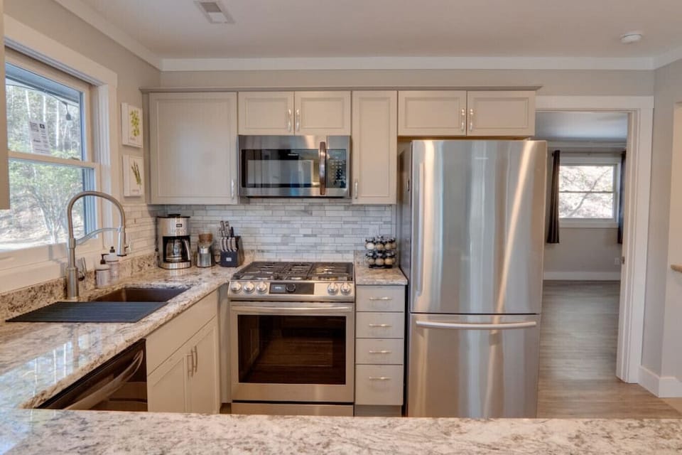 Stainless steel appliances makes the kitchen a dream to cook in. We do have spices and a variety of pots and pans for cooking.