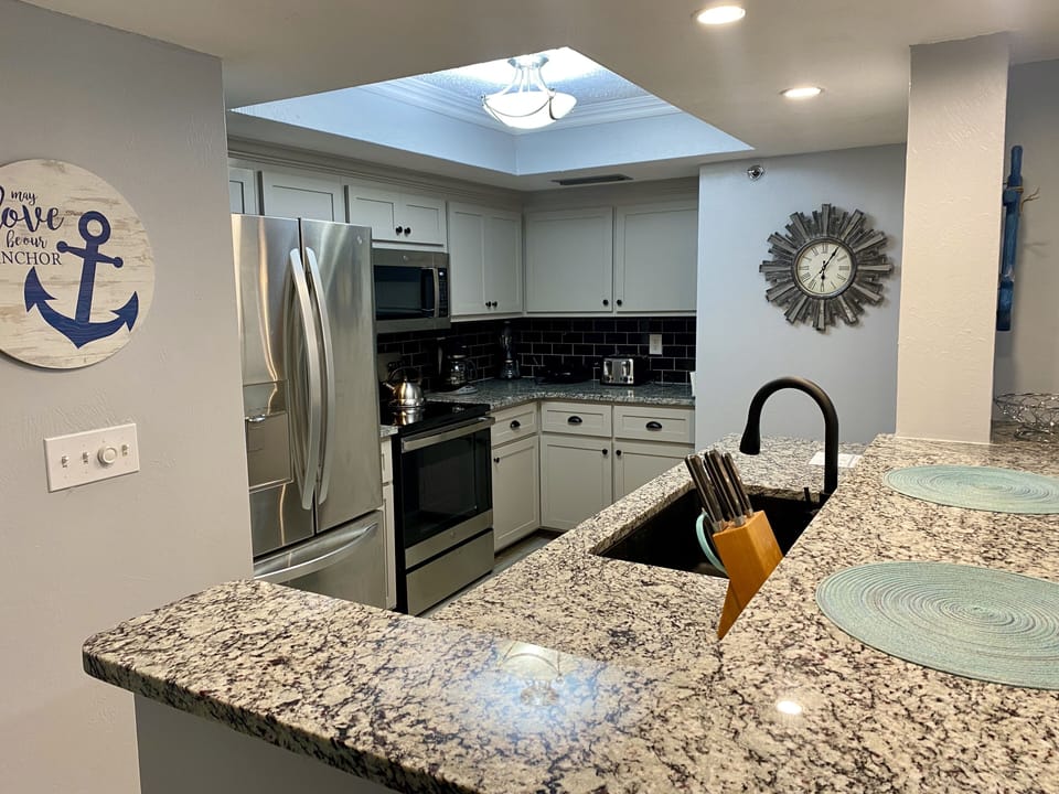 Fully equipped an updated kitchen complete with breakfast bar
