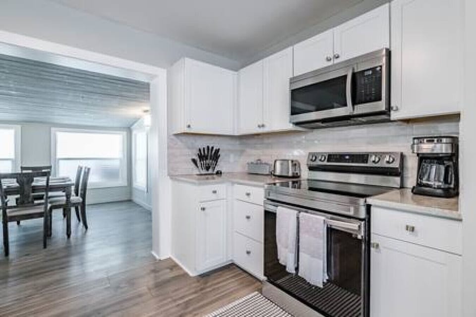 Fully Updated Kitchen Stocked with Stainless Steel Appliances