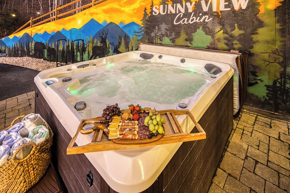 Enjoy a relaxing hot tub soak with a bright mountain mural backdrop.
