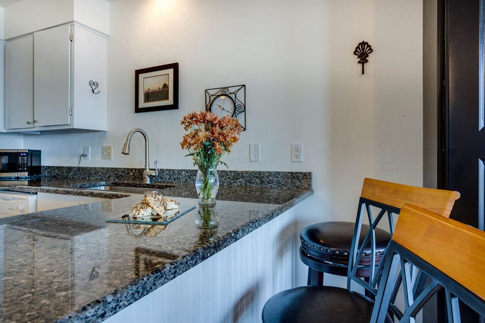 Sit at the counter and chat with the cook.