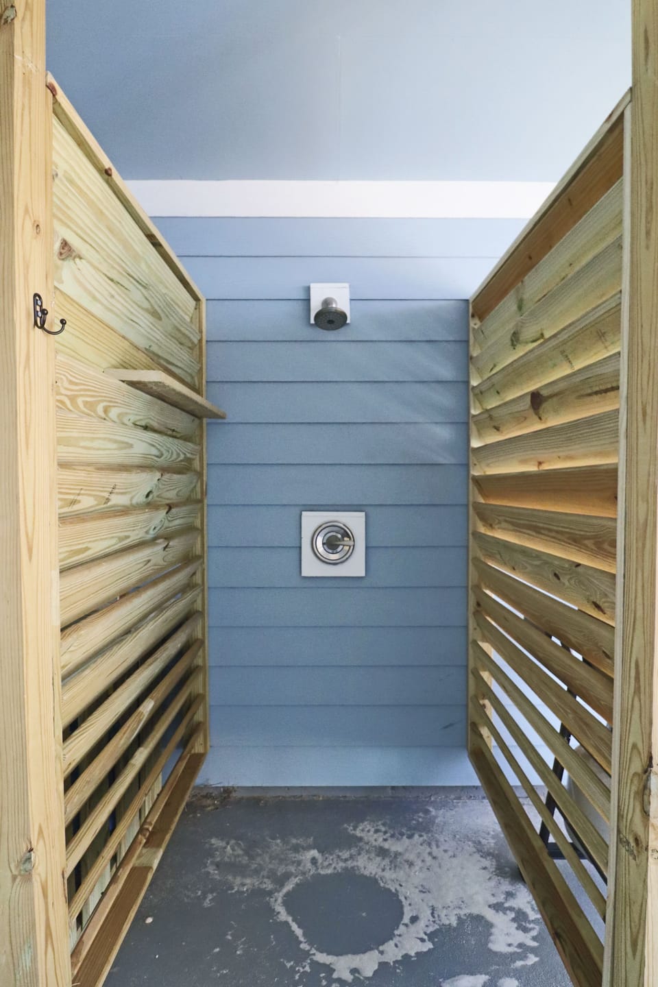 Convenient outdoor shower for washing off before entering the home.