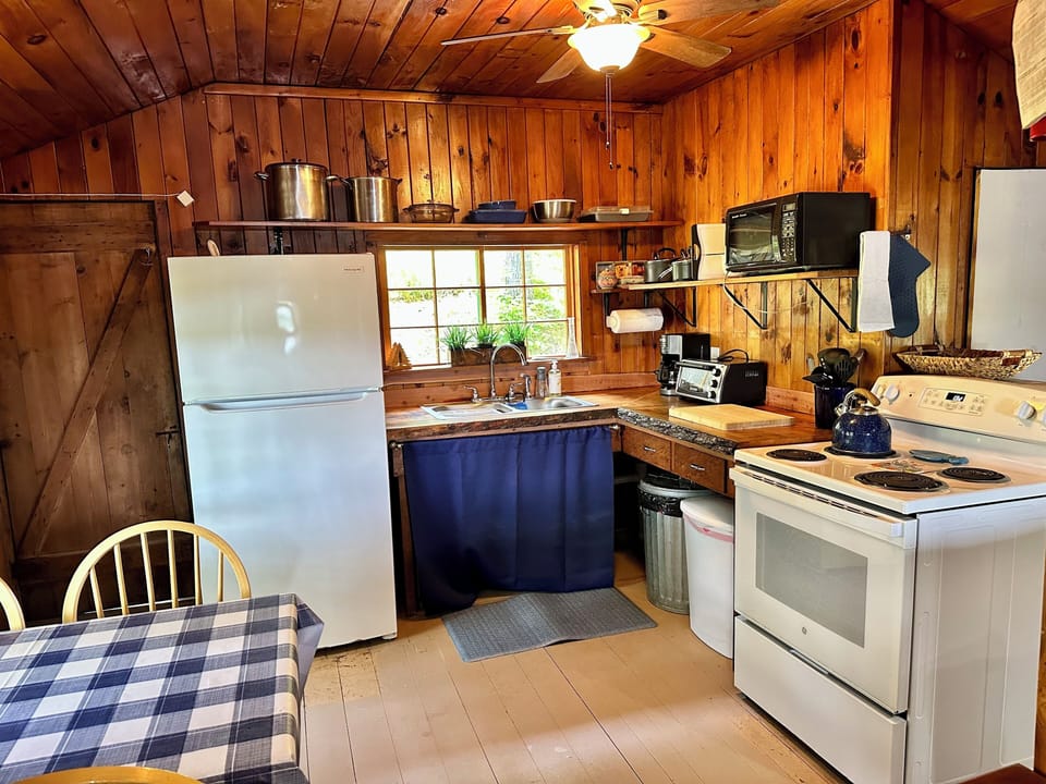 Full Kitchen with live edge counter tops. 