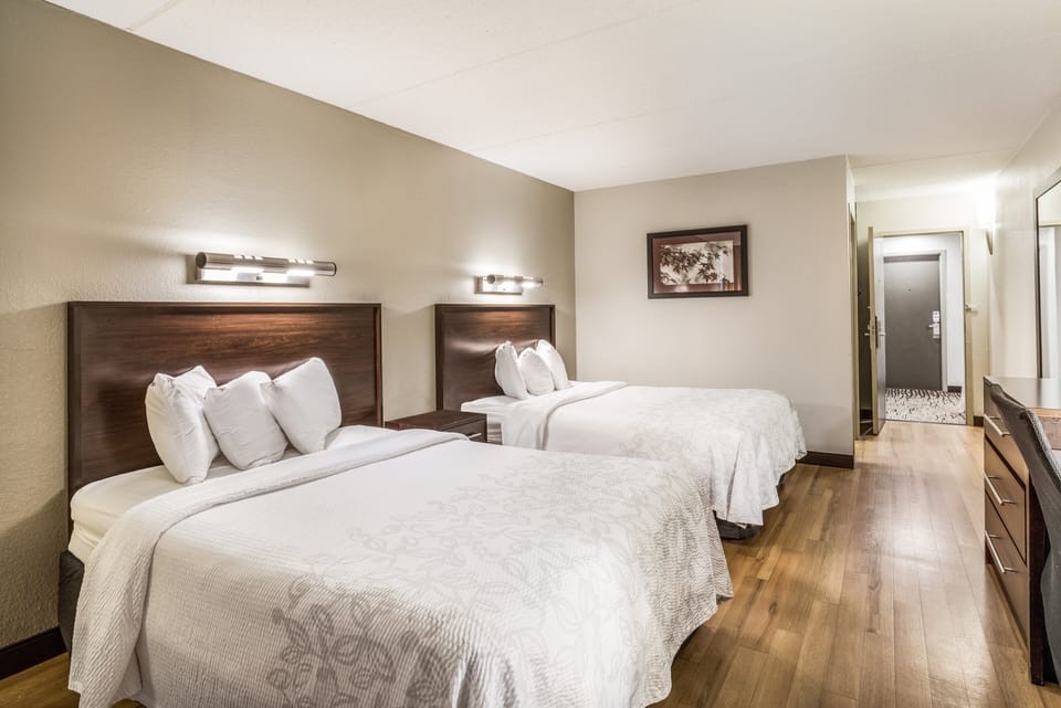 Spread out comfortably with two beds and fresh white linens.