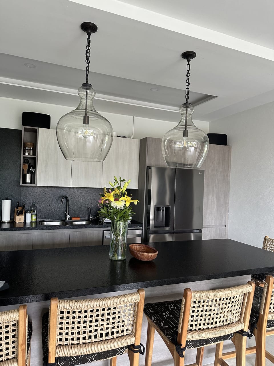 Full kitchen with additional kitchenette within the condo