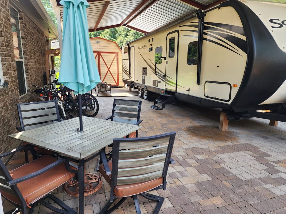 Home away from home. Outdoor table and seating. Grill available for use too. 