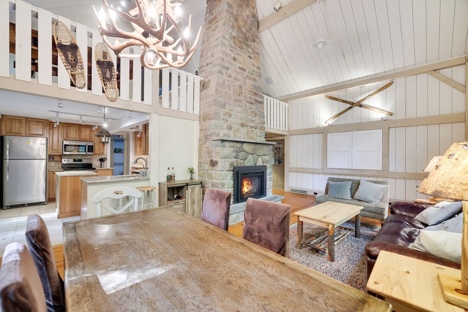 open living room/dining room with gas fireplace