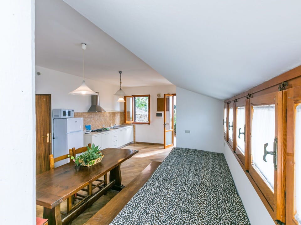 Furniture, Table, Window, Building, Wood, Houseplant, House, Interior Design, Flooring, Floor