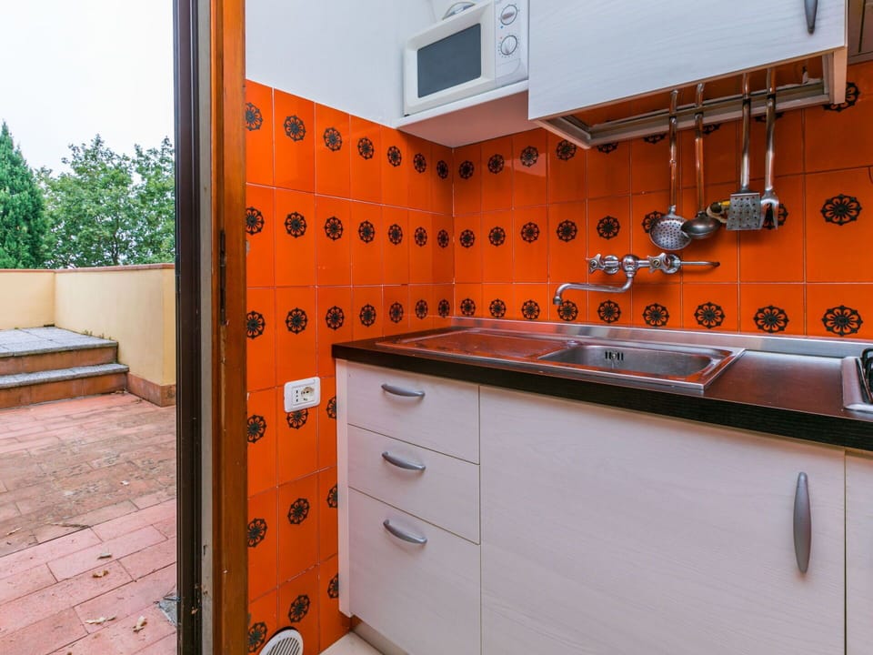 Cabinetry, Wood, Orange, Interior Design, Kitchen Appliance, House, Building, Drawer, Countertop, Kitchen