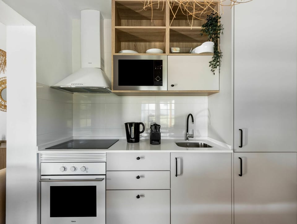 Countertop, Cabinetry, Property, Furniture, White, Building, Product, Kitchen, Kitchen Stove, Black
