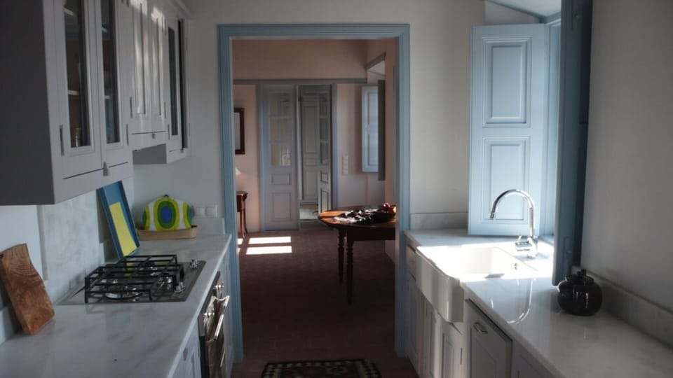 Easy access between kitchen and living room and main terrace.