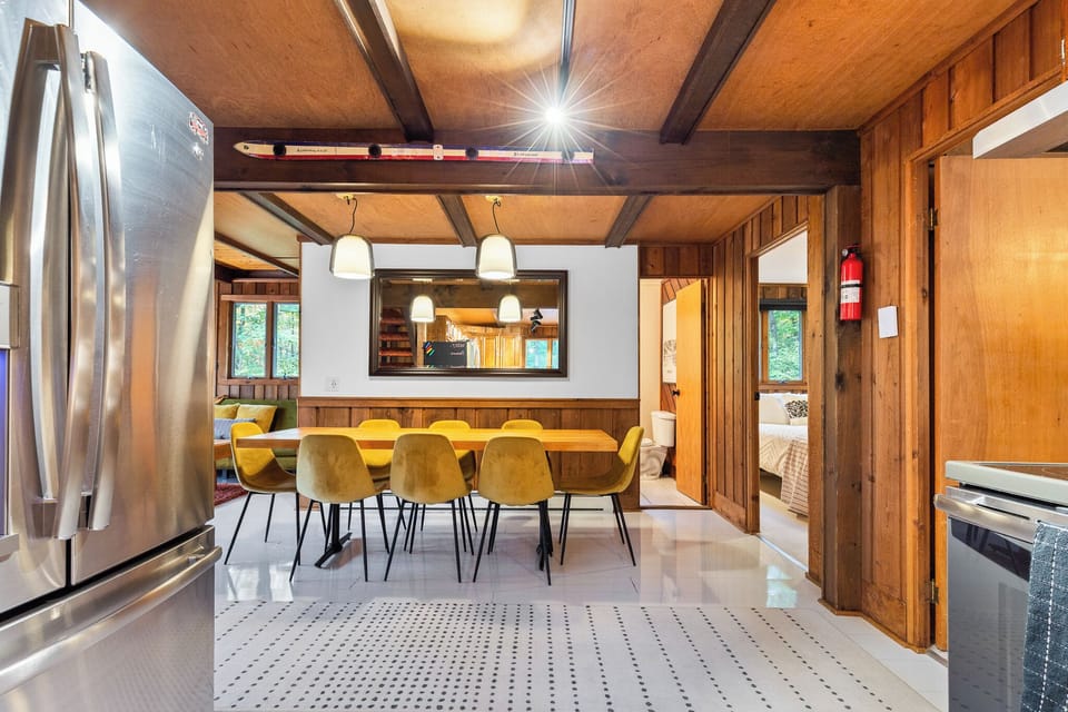 Dining room viewed from the kitchen—easy, social flow.