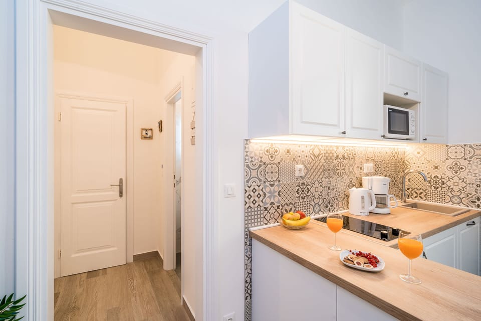 Kitchen and hall to the bathroom