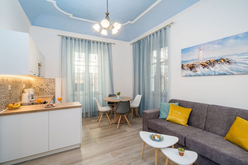 Living room with kitchen and dining area 