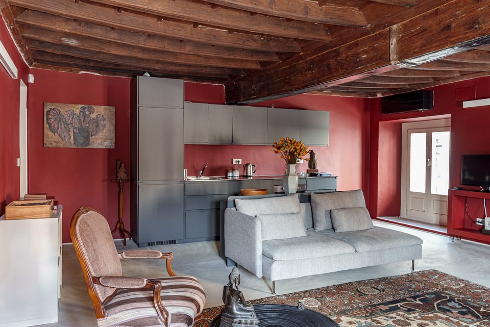 The living room with the kitchenette