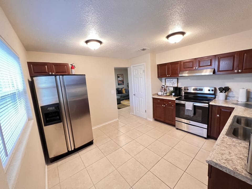 Modern cooking appliances and countertops.