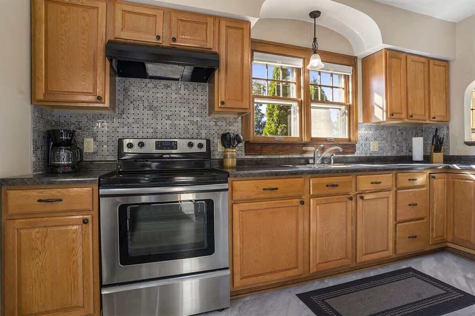 The Generous Counterspace and Updated Appliances in Heart of SoHa`s Kitchen is Bound to Make Meal Prep a Breeze