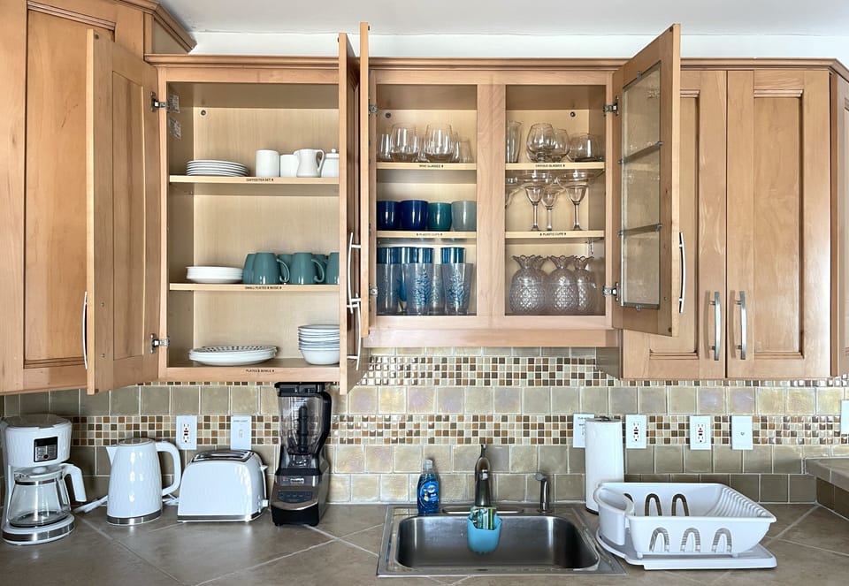 Well-appointed kitchen with everything you would need. Dishwasher near sink.