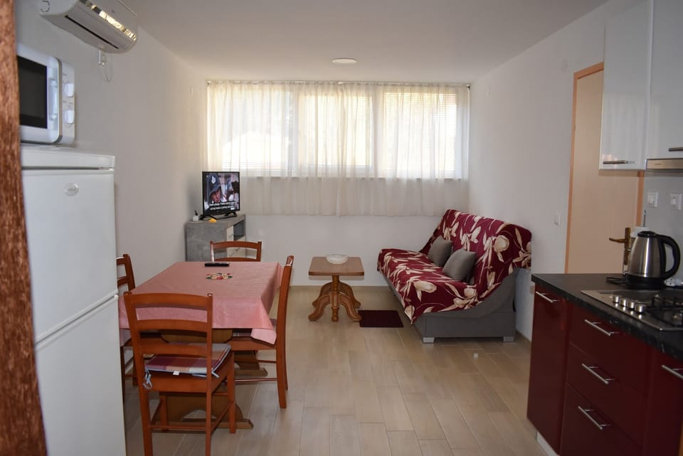 Living room, dining area, kitchen