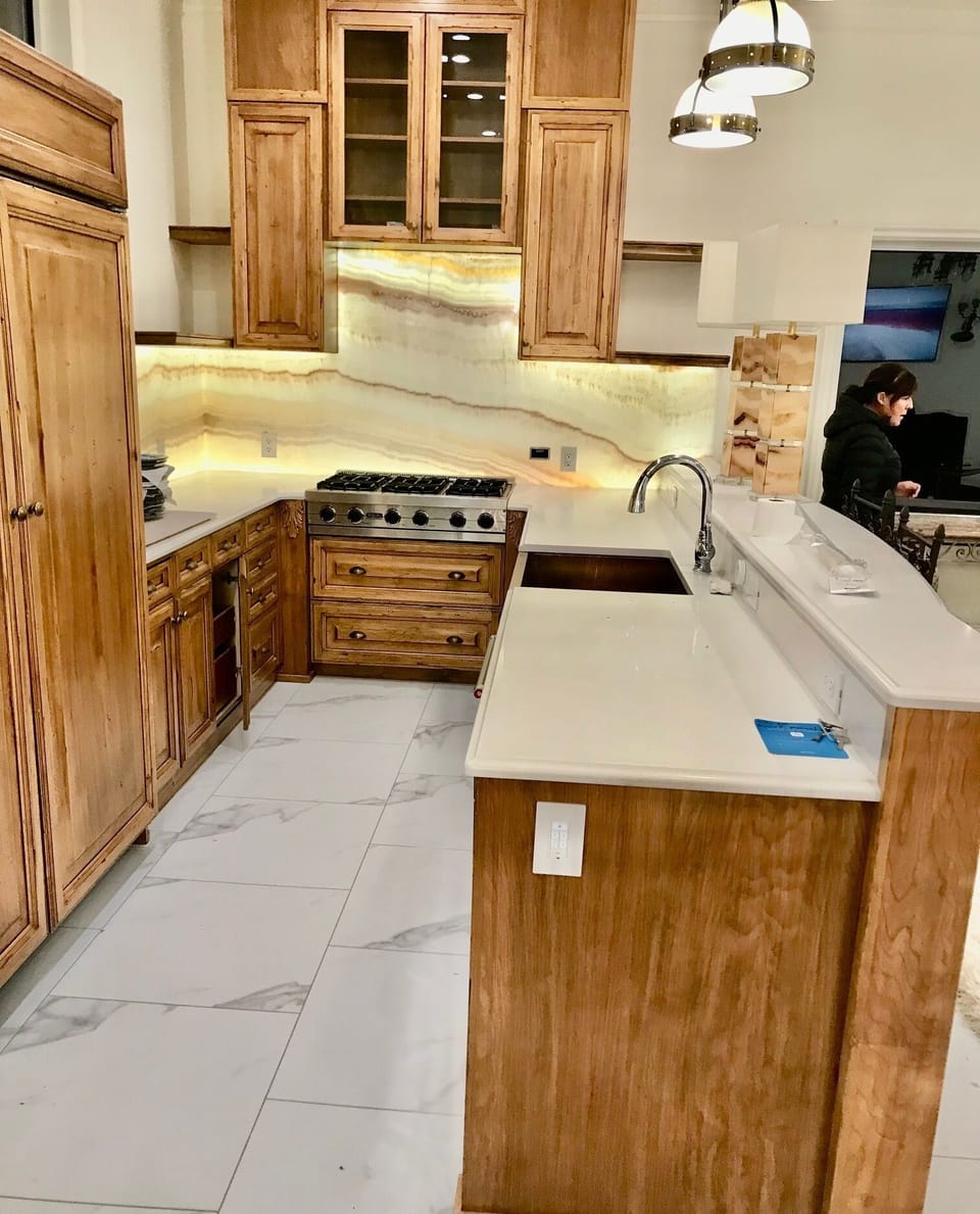 Gourmet Kitchen with lit onyx backsplash