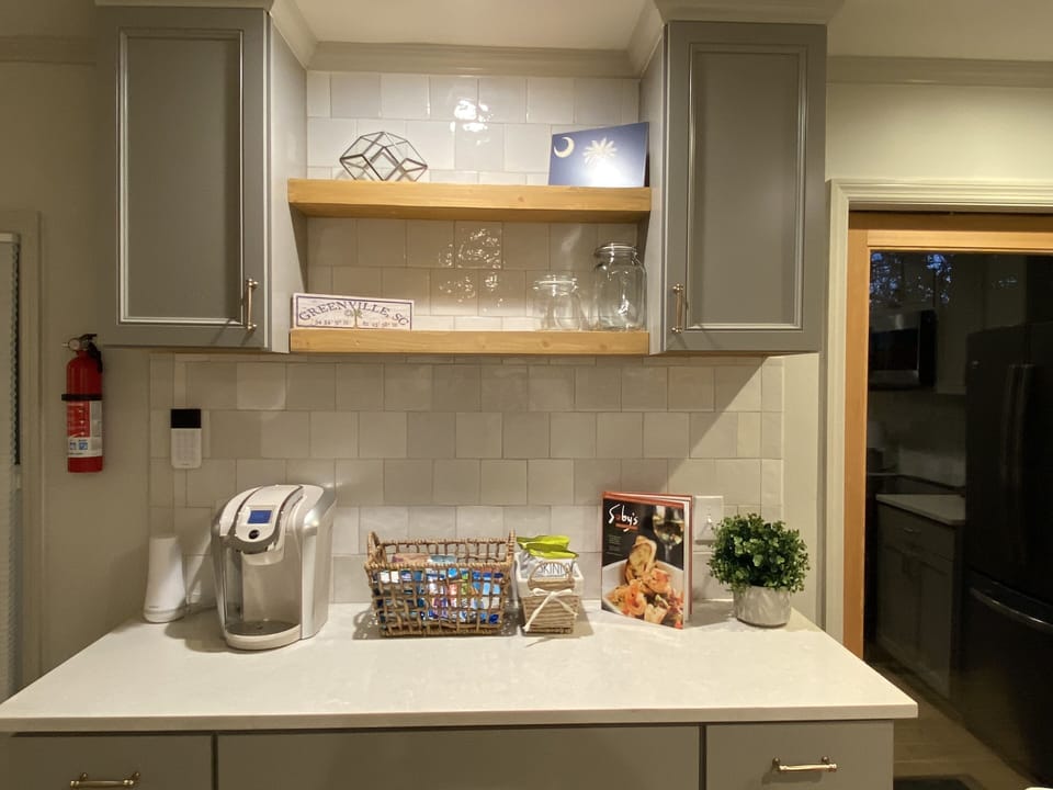 Kitchen is stocked with snacks, Keurig coffee machine & kcups, water & La Croix.