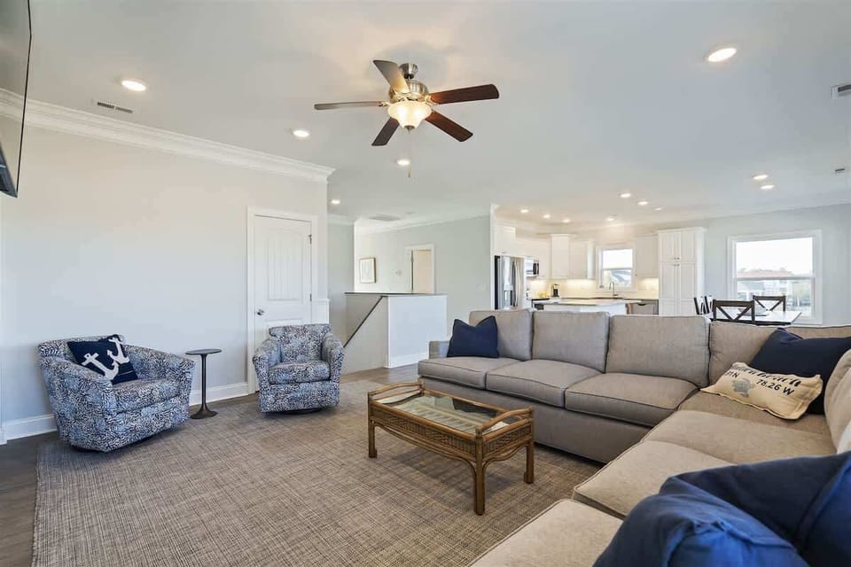 Living Room Oasis: Bright, airy space with inviting seating, perfect for gatherings and relaxation!