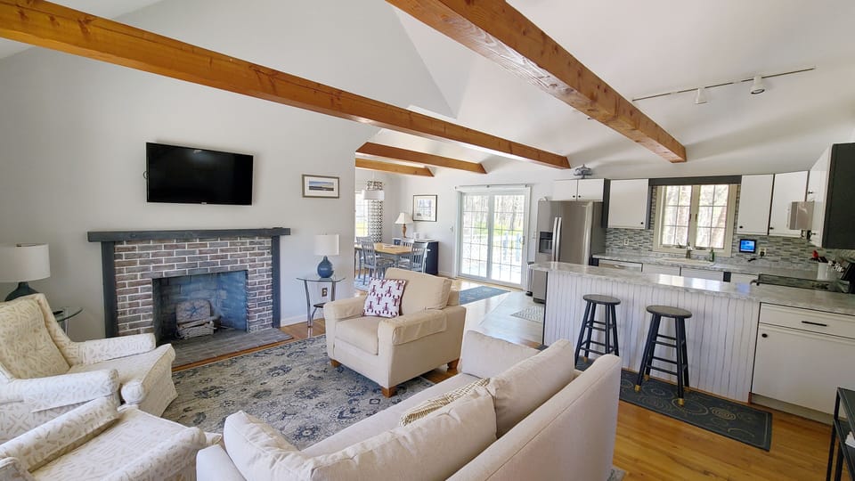 Living room opens to kitchen