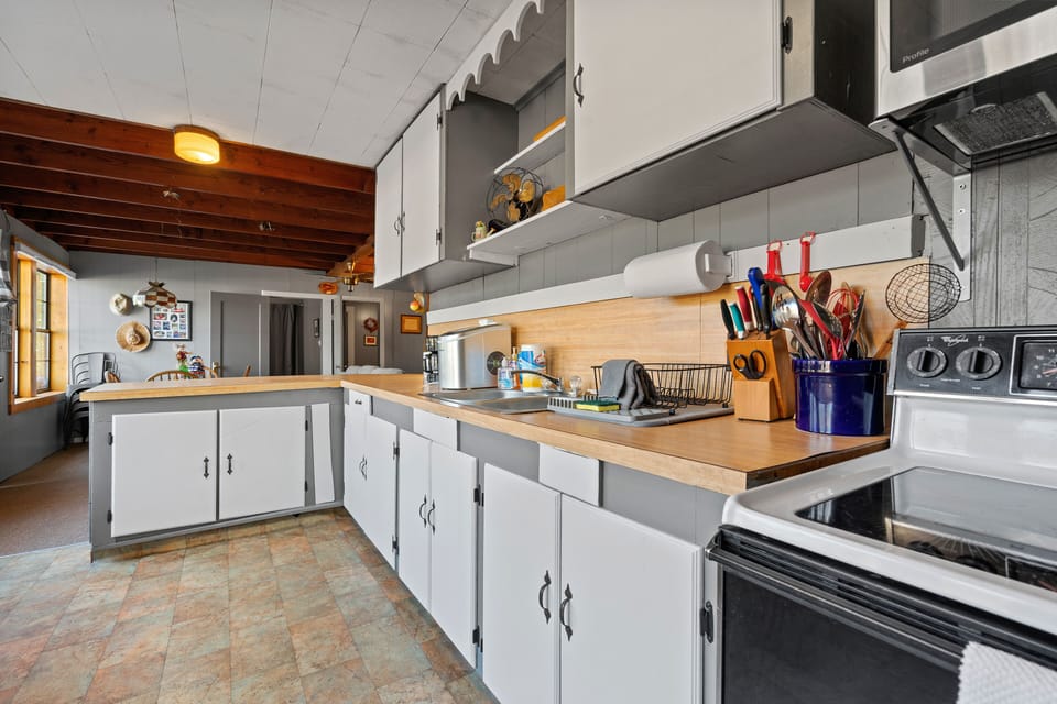 Mixing bowls, cooking utensils, pots and pans, cookie sheets, etc