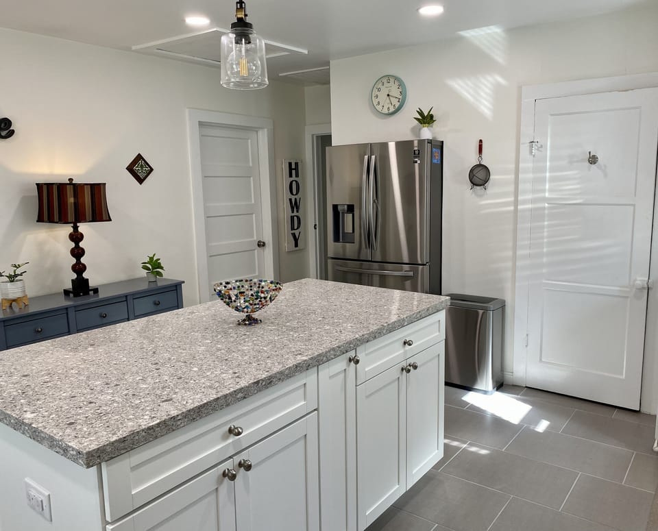 HUGE kitchen with barstools and every kitchen amenity you could ever imagine.