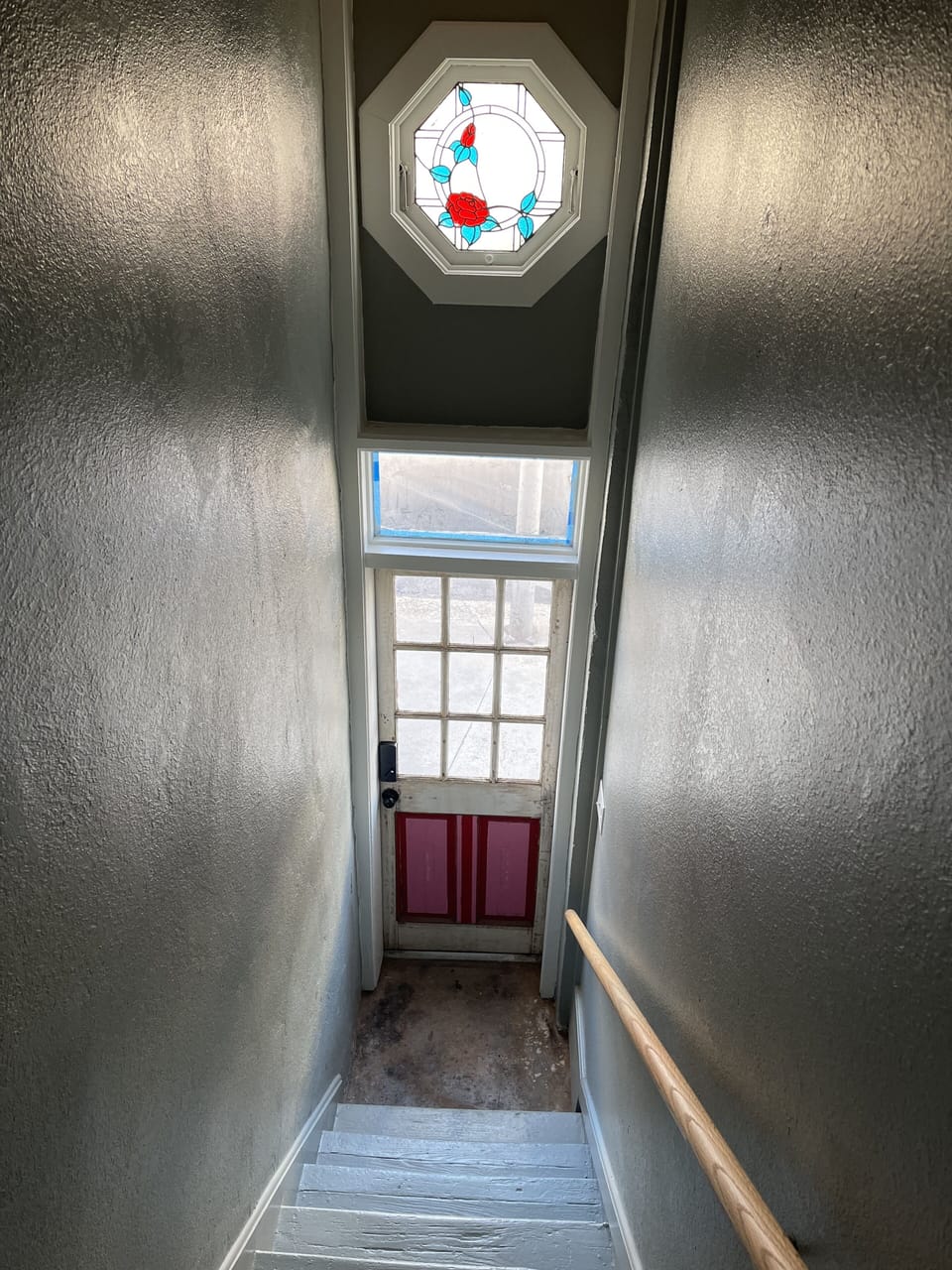 Stairs UP to apartment. 