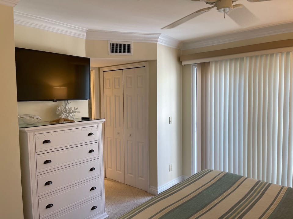 Main Bedroom with Ensuite Full Bath and Attached Open Balcony