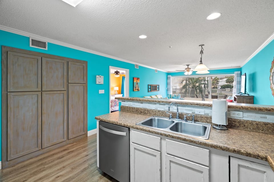 Built in cabinets contain extra beach supplies and have plenty of empty storage to hold any food and extras that you bring or buy once you arrive