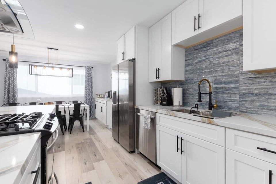 Brand new stainless steel appliances. Large undermount sink. Variety of spices. All the kitchen tools you need for prepping and serving your favorite dish!