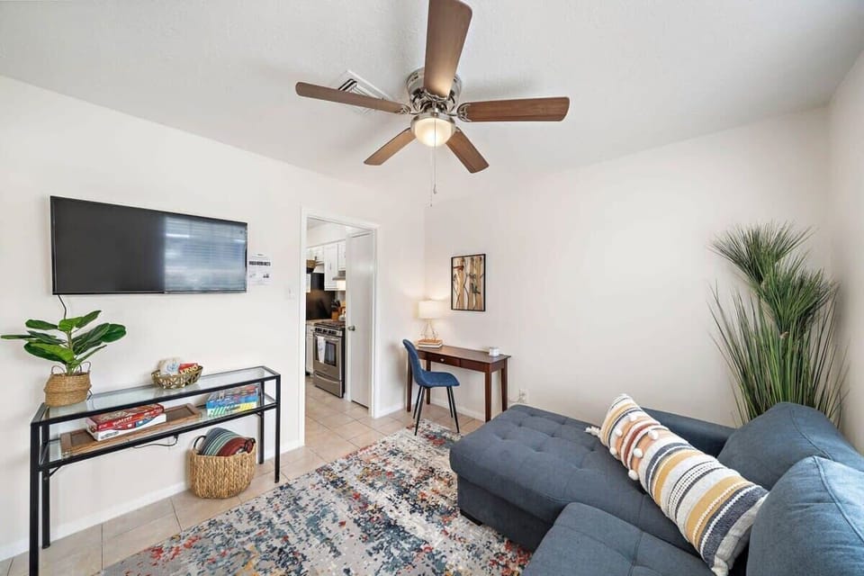 Living Room: Bright space with a Smart TV and stylish decor—perfect for fun gatherings!