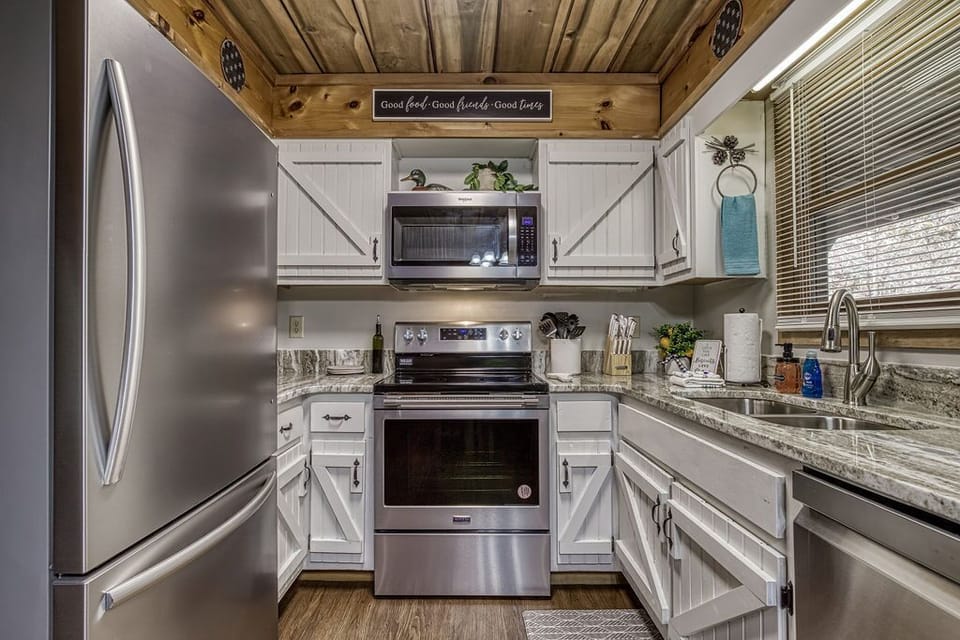 Freshly renovated kitchen with new appliances! Granite counter