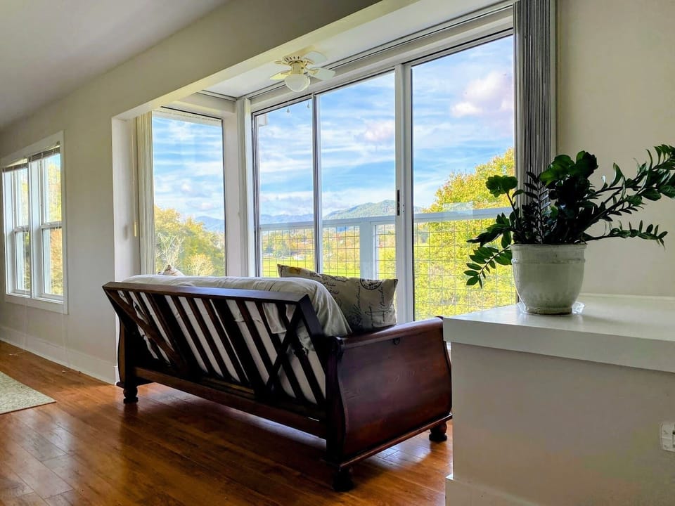 Gorgeous view of autumn colors from sunroom/hallway futon.