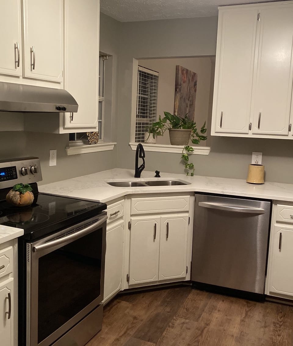 Kitchen is well equipped with stainless-steel appliances.
